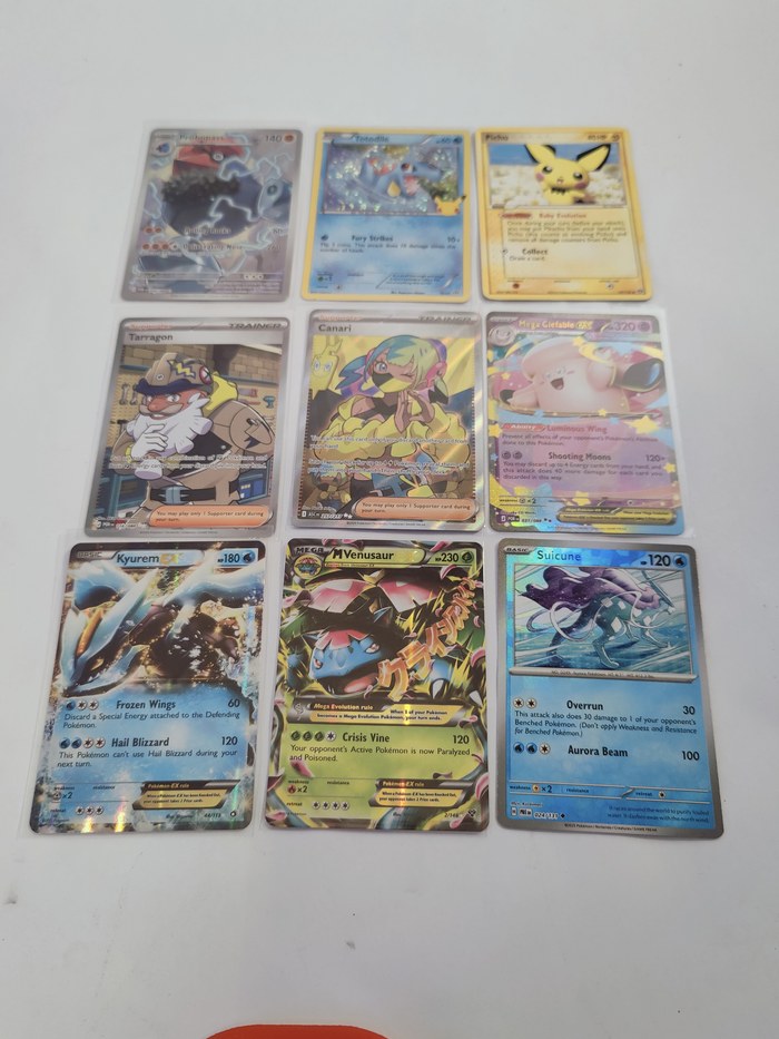 Nine cards laid out in one phone photo